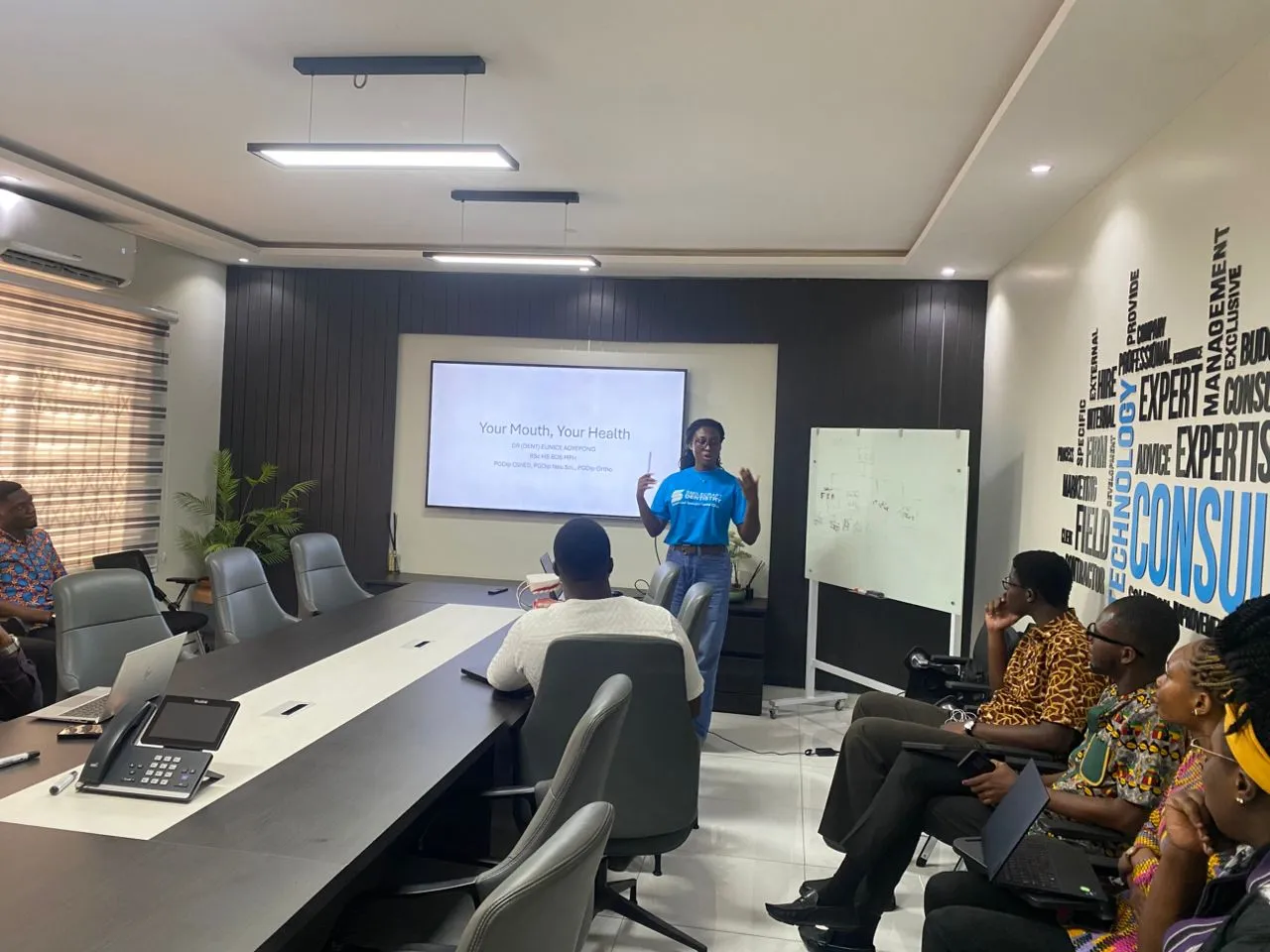 Dr. Eunice Aduapong presenting a dental health talk at Esolutions Limited, East Legon